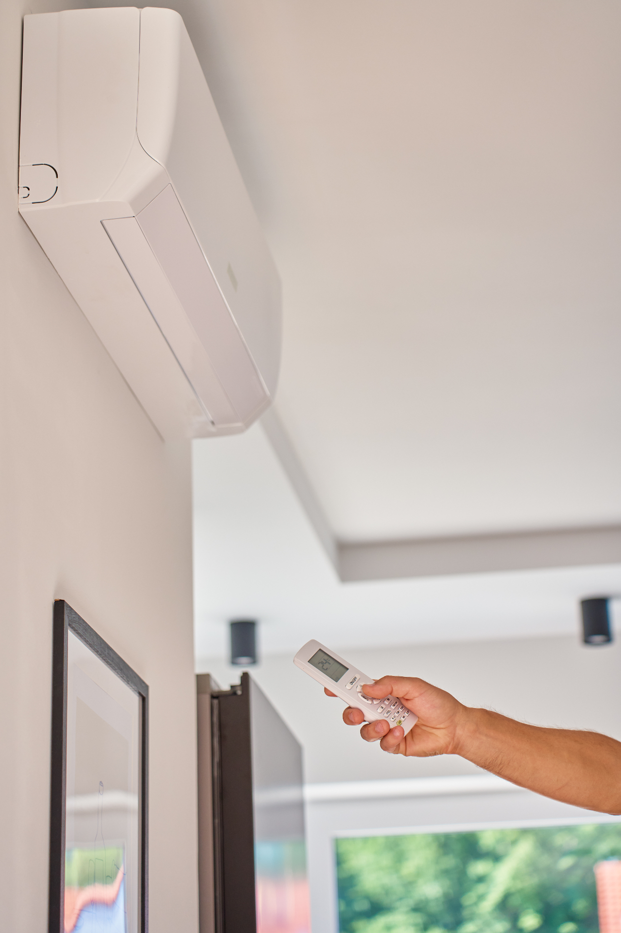 Wall-mounted air conditioning unit installed in a Milton Keynes home.